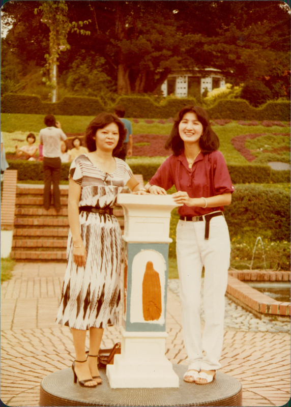 Wei Keong inherited his mother's smile. Here she is posing with a friend for a photo by the sundial at the Botanical Gardens. Photo: Tan Wei Keong