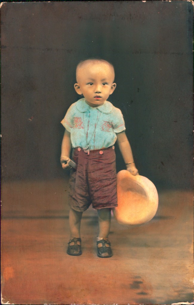 Hand-colored photograph of a boy. Photo: Wong Meng