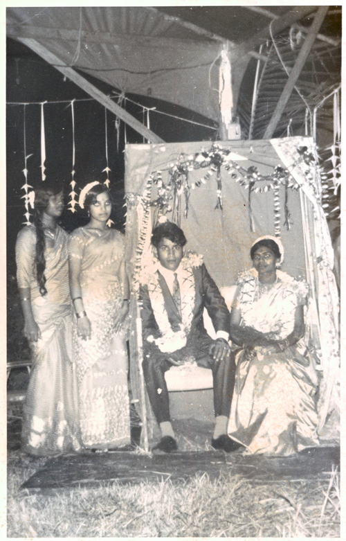 Bride & Groom - a photograph of Mdm Saraswathi's wedding held at a tent pitched on a field in Seletar Camp. Photo credit: Mdm Saraswathi