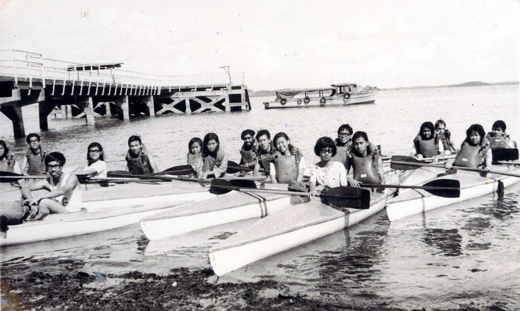 A group of youths paddling their canoes and learning team work in the process. Photo: Soh Khim Choo